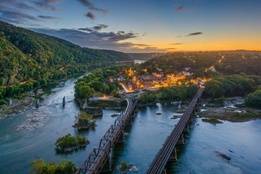 Harpers ferry with train bridges running over the water
