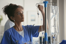 nurse replacing IV bag in new jersey
