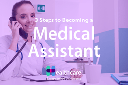 Young woman in scrubs working at front desk in hospital